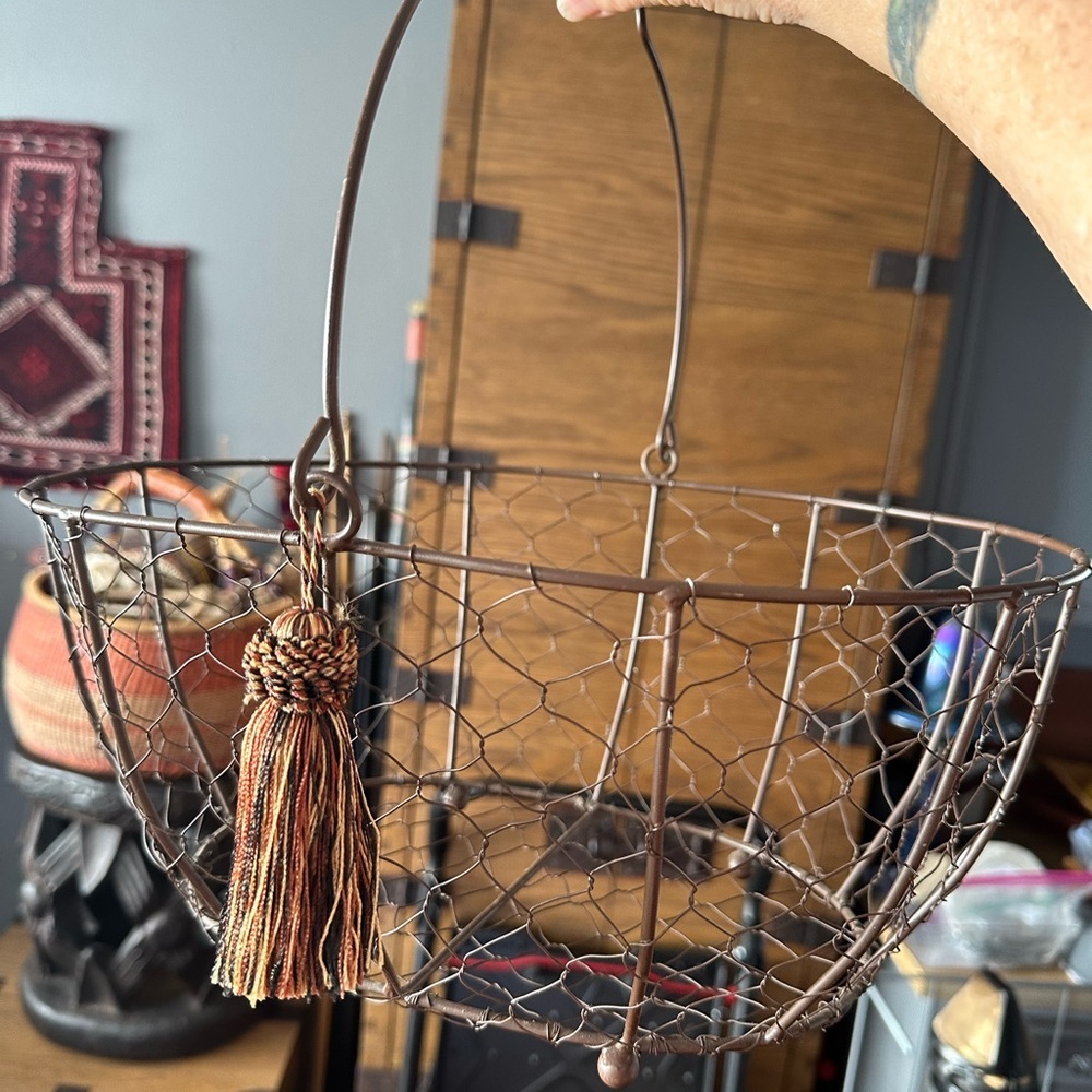 Rustic chicken wire basket w wood handle. Tassel. Farmhouse home decor Vintage